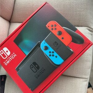 Nintendo Switch with Vibrant Red and Blue Controllers